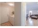 Laundry room with a washer, dryer and access to the living area at 43409 W Sagebrush Trl, Maricopa, AZ 85138