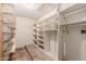 Basement storage room with painted shelves at 4510 W Keim Dr, Glendale, AZ 85301