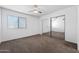 Bedroom with mirrored closet and a large window allowing for plenty of natural light at 461 W Holmes Ave # 383, Mesa, AZ 85210