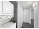 The laundry room is bright and clean with a washer and dryer set, storage cabinets, and good lighting at 461 W Holmes Ave # 383, Mesa, AZ 85210