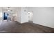 View of the living room, kitchen, and laundry area that offers convenience at 461 W Holmes Ave # 383, Mesa, AZ 85210