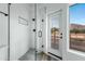 Clean bathroom featuring a sleek glass-enclosed shower and modern fixtures at 4955 E Indian School Rd # 5, Phoenix, AZ 85018