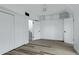 Bedroom with closet space, neutral paint, and modern flooring at 4955 E Indian School Rd # 5, Phoenix, AZ 85018