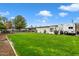 Expansive backyard featuring a well-manicured lawn and private pool at 5629 E Thunderbird Rd, Scottsdale, AZ 85254