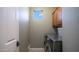 Functional laundry room featuring modern washer and dryer, providing convenience for everyday chores at 6774 S Pinehurst Dr, Gilbert, AZ 85298