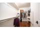 Spacious walk-in closet with ample shelving and hanging space for optimal organization and storage at 6774 S Pinehurst Dr, Gilbert, AZ 85298