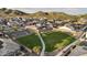 Aerial view of the Noravita community with a large grassy park area at 7414 W Whitehorn Trl, Peoria, AZ 85383