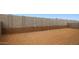 The backyard has a block wall and a dirt landscape at 7414 W Whitehorn Trl, Peoria, AZ 85383
