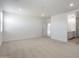 Expansive carpeted bonus room with natural light, leading to a bathroom and closet at 7414 W Whitehorn Trl, Peoria, AZ 85383