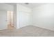 Bedroom featuring a large closet, and comfortable carpeting at 7414 W Whitehorn Trl, Peoria, AZ 85383