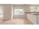 Bright dining area with large window and view of the outdoor living space at 7637 W North Ln, Peoria, AZ 85345