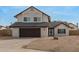 Charming two-story home with a two-car garage and desert landscaping in a quiet neighborhood at 7637 W North Ln, Peoria, AZ 85345