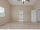 Spacious main bedroom showcasing a walk-in closet and attached ensuite bathroom at 7637 W North Ln, Peoria, AZ 85345