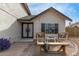 Inviting patio with comfortable seating and a charming bench, perfect for relaxing outdoors at 7637 W North Ln, Peoria, AZ 85345