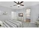 Bright and cozy bedroom offering a glimpse into the en suite bathroom at 7769 S Reseda St, Gilbert, AZ 85298