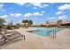 A refreshing community pool with lounge chairs and an inviting atmosphere at 7769 S Reseda St, Gilbert, AZ 85298