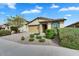 Attractive home featuring neat landscaping, a brick driveway, and a convenient two-car garage at 7769 S Reseda St, Gilbert, AZ 85298
