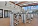 Bright community fitness center with cardio and weight equipment, plus mirrored walls at 7769 S Reseda St, Gilbert, AZ 85298