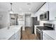 Stylish kitchen with a large sink, stainless steel appliances, and ample countertop space at 7769 S Reseda St, Gilbert, AZ 85298