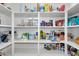 Well-organized walk-in pantry with ample shelving and plenty of storage space for groceries at 7769 S Reseda St, Gilbert, AZ 85298