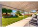 This outdoor area features a large patio with grass and a storage shed at 8345 E Oak St, Scottsdale, AZ 85257