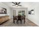 Dining room with modern decor, a ceiling fan, and large windows providing lots of natural light at 8345 E Oak St, Scottsdale, AZ 85257