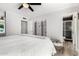 Cozy main bedroom featuring an ensuite bathroom, a ceiling fan, and a relaxing atmosphere at 8345 E Oak St, Scottsdale, AZ 85257
