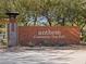 Welcoming brick sign for Anthem Community Dog Park framed by mature trees and landscaping at 8530 W Trenton Ct, Florence, AZ 85132