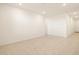 Spacious living room with neutral walls and tile flooring, perfect for entertaining at 8576 W Trenton Ct, Florence, AZ 85132