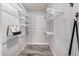 Walk-in closet with wire shelving and ample storage, perfect for organizing clothes, shoes, and accessories at 1002 W Fairway Dr, Mesa, AZ 85201