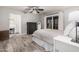 Calm, serene main bedroom features backyard views, neutral decor, and an attached vanity area at 1002 W Fairway Dr, Mesa, AZ 85201