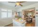 Modern kitchen featuring stainless steel appliances and wood flooring at 10417 W Deanne Dr, Sun City, AZ 85351