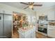 Modern kitchen featuring stainless steel appliances and wood flooring at 10417 W Deanne Dr, Sun City, AZ 85351