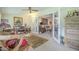 Home office featuring an open layout, dual desks, and seamlessly connected to the living room at 10417 W Deanne Dr, Sun City, AZ 85351