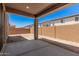 Covered patio area with concrete flooring and an enclosed backyard perfect for outdoor enjoyment at 11611 W Green Dr, Youngtown, AZ 85363