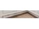 An image of neutral toned floor tiles, baseboards and shelfing at 11611 W Green Dr, Youngtown, AZ 85363