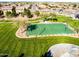 Aerial view of a green basketball court in a well-maintained community park at 1414 W Alder Rd, Queen Creek, AZ 85140