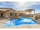 Refreshing pool with sunshade and desert plants at 1414 W Alder Rd, Queen Creek, AZ 85140