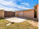 Yard view of a large shed and fenced-in area offering ample storage space for tools, equipment, and toys at 14317 N 78Th Dr, Peoria, AZ 85381