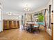 Dining area with seating for four and views to the backyard at 14317 N 78Th Dr, Peoria, AZ 85381