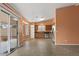 Open-concept eat-in kitchen and dining area with tile floors and stainless steel appliances at 14527 W Marcus Dr, Surprise, AZ 85374