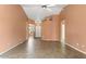 Spacious living room with tile floors, neutral paint, and ample natural light at 14527 W Marcus Dr, Surprise, AZ 85374