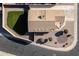Bird's-eye view of house featuring a well-maintained roof, gravel landscaping, and green lawn at 14717 N 130Th Ln, El Mirage, AZ 85335