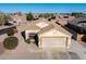 Charming single-Gathering home featuring a two-car garage and desert landscaping in a well-maintained neighborhood at 14717 N 130Th Ln, El Mirage, AZ 85335