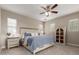 Comfortable bedroom featuring a ceiling fan, soft lighting, and neutral colors for a relaxing ambiance at 15239 W Alexandria Way, Surprise, AZ 85379