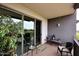 Private balcony with comfortable seating and scenic golf course views at 15802 N 71St St # 501, Scottsdale, AZ 85254