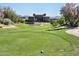 Golf course view overlooking the green with a lake and mountain views at 15802 N 71St St # 501, Scottsdale, AZ 85254