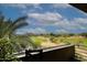 Balcony overlooking the sprawling golf course with scenic views, a desert oasis at 15802 N 71St St # 501, Scottsdale, AZ 85254