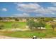 Expansive view of the lush green golf course and desert landscaping at 15802 N 71St St # 501, Scottsdale, AZ 85254