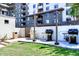 Well-maintained outdoor grilling area with modern barbecue grills and lush green lawn at 15802 N 71St St # 501, Scottsdale, AZ 85254